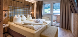 Foto: Schlafzimmer vom Appartement Ferienwohnung Hohe Salve im Last Minute Urlaub mit Hund in Tirol Söll Wilder Kaiser