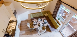 Foto: Wohnraum im Appartement Ferienwohnung Salvenberg im Last Minute Urlaub mit Hund in Söll Tirol Wilder Kaiser